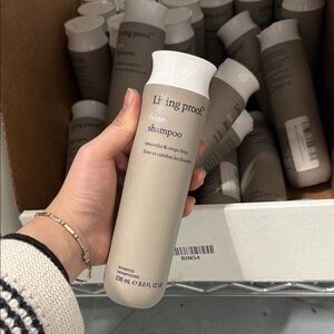 Living Proof Anti-Frizz Shampoo in Cream and White